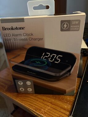 Brookstone Black LED Alarm Clock with Wireless Charging Pad
